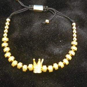 Gold crown charm bracelet